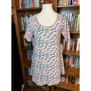 Pastel dusty pink fit and flare tunic top with ringer sleeves